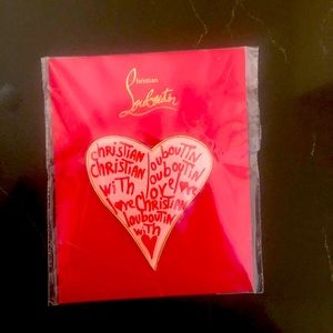 Christian Louboutin heart pin